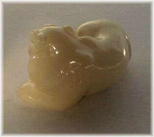  японская нэцкэ из моржового клыка РЫЧАЩИЙ ТИГР