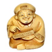японская нецке из слоновой кости Даикоку, один из Семи Богов Счастья