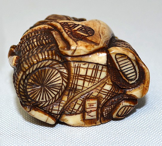 подпись мастера на японской нецке конца эпохи Эдо