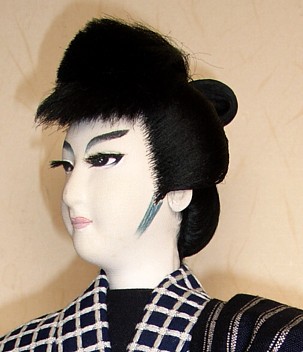 japanese antique silk faced doll of samurai traveler