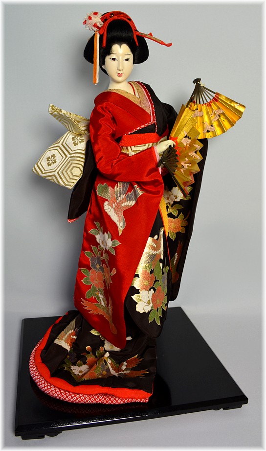 japanese traditional doll of a woman dancing with fans in her hands, 1970's