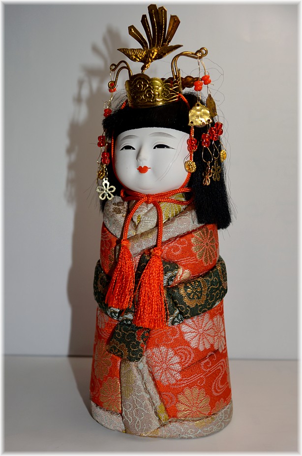 japanese kimekomi doll of a little princedd with tiara on her head