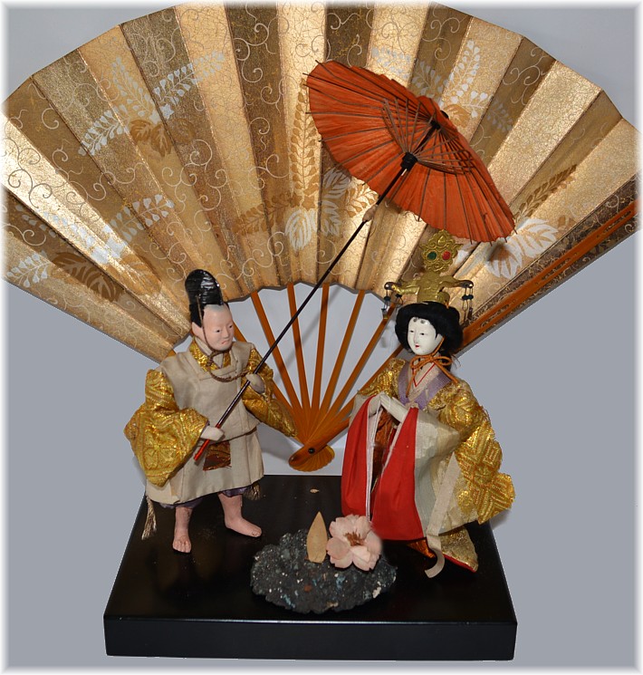 japanese antique doll of the Empress and her servant holding a big parasol