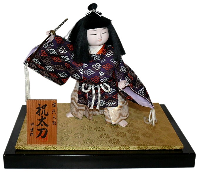 japanese traditional doll of young samurai with sword tachi in his hand, 1960's