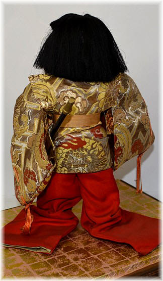 Japanese antique doll of a Boy Courtier dressed with naga hakama pants