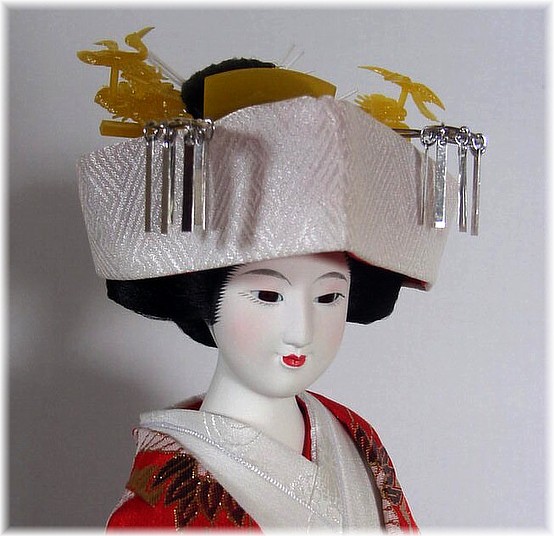 Japanese traditional bride doll in wedding kimono and bride's hat