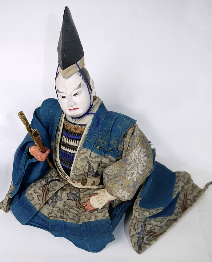 samurai warrior lord sitting with command fan in his hand, Japanese antique doll, 1900's