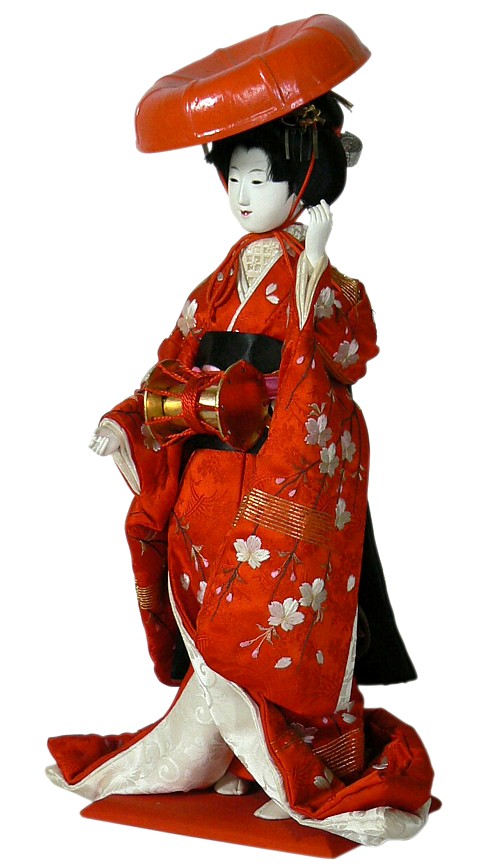 japanese antique doll in red hat