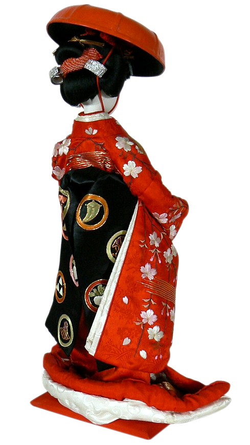 japanese antique doll in red hat
