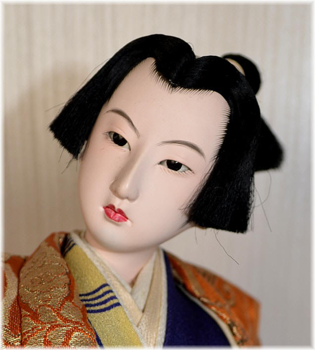 japanese antique doll of a young samurai traveler 