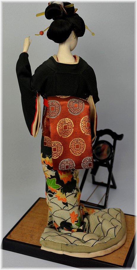 japanese antique doll in black silk kimono