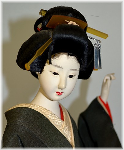 japanese antique doll in black silk kimono