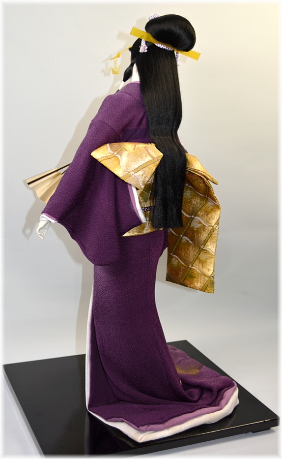 japanese traditional doll of a young woman dancing with folding fan in her hand, 1970's
