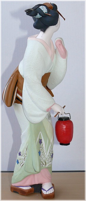 Hakata figurine of a woman with lantern, 1950's