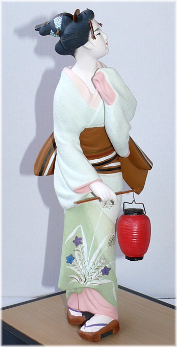 Hakata figurine of a woman with lantern, 1950's