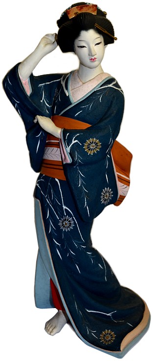 Japanese traditional ceramic doll of a woman in dark blue kimono