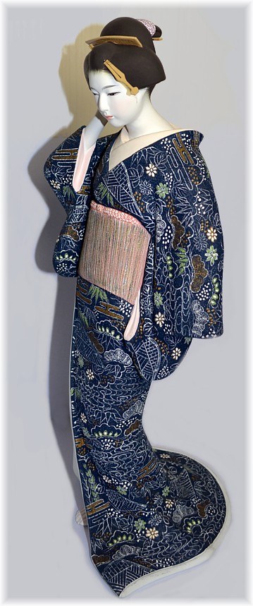 A woman in dark-blue kimono, Japanese Hakata doll