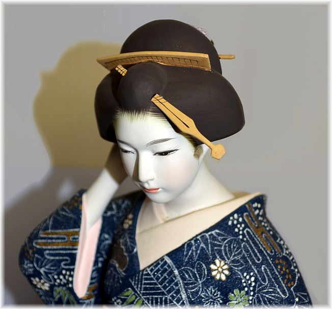 Japanese Hakata doll of a woman in dark blue kimono,1960's